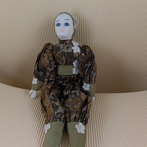 Vintage porcelain clown grey doll