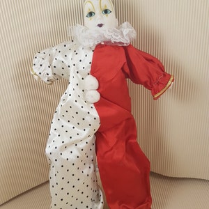 Vintage porcelain clown white red doll