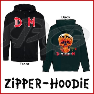 May include: Black zipper hoodie with a red "DM" on the front and a skull with a rose and the text "Depeche Mode - est. 1980 -" on the back.