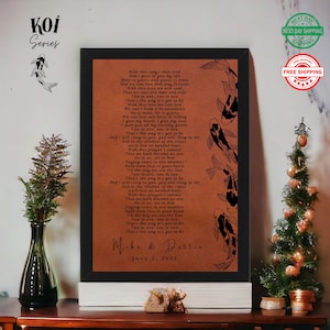 May include: Framed artwork featuring a poem with a brown background and black text. Koi fish illustrations are on the right side. The bottom of the artwork has the names "Mike & Dottie" and the date "June 3, 2022".