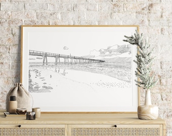 May include: A black and white line drawing of a pier extending out over the ocean. The pier is made of wood and has a railing on either side. The ocean is calm and the sky is cloudy. The drawing is framed in a light wood frame and is hanging on a white brick wall.