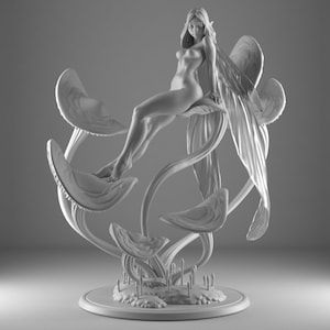 May include: A grayscale sculpture of a fairy figure seated on stylized mushroom-like structures. The fairy has long hair, delicate wings, and is posed gracefully. The sculpture is detailed and stands on a round base.