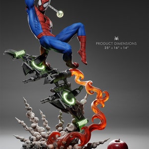 May include: A detailed statue of Spider-Man in a dynamic pose, wearing his classic red and blue suit. The statue is mounted on a futuristic base with green glowing accents and fiery orange and red effects. Product dimensions are 25" x 16" x 14".
