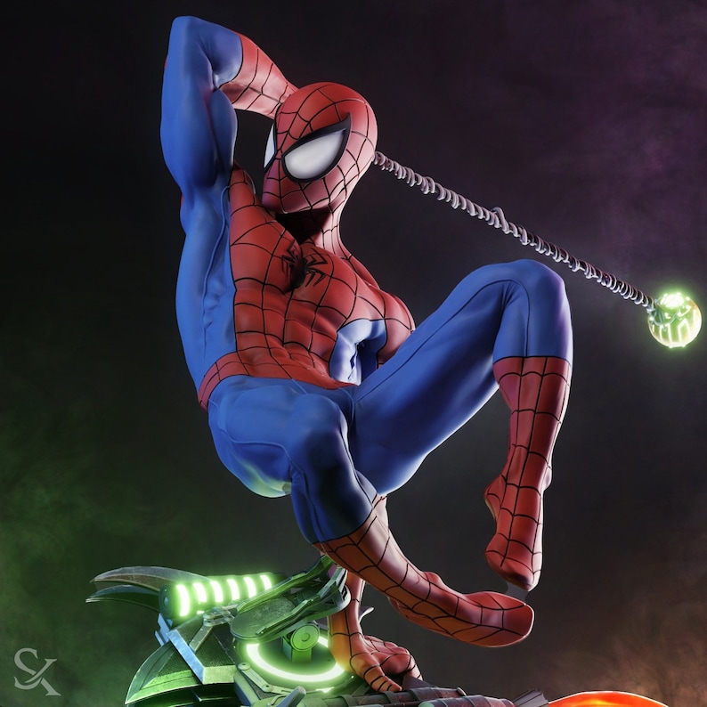 May include: A dynamic sculpture of Spider-Man in a classic pose, clad in a red and blue suit. The figure is poised mid-action, with a web-like strand extending towards a glowing orb. The base features a futuristic design with green accents.