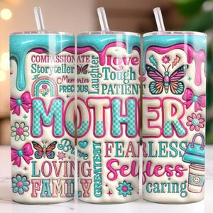 May include: Three insulated tumblers with straws, featuring a colorful design. The design includes the word "MOTHER" in large letters, surrounded by words like "compassionate," "loving," and "fearless," along with butterflies, flowers, and bows.