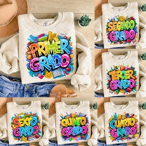 Puede incluir: Sudaderas color crema con texto y gráficos coloridos. Las sudaderas muestran las palabras "PRIMER GRADO", "SEGUNDO GRADO", "TERCER GRADO", "CUARTO GRADO", "QUINTO GRADO" y "SEXTO GRADO" en letras vibrantes estilo grafiti, rodeadas de ilustraciones escolares.