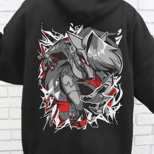 May include: Black hoodie featuring a gray and red graphic of a wolf-like creature. The design is surrounded by white and red jagged lines. The hoodie has a hood and long sleeves. The words "FAST DELIVERY" are printed in red and white.
