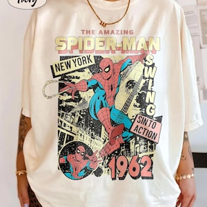 May include: A white ceramic mug with a black handle and the text "But First, Coffee" in a handwritten style. The mug is on a white surface. The mug is 4 inches tall.