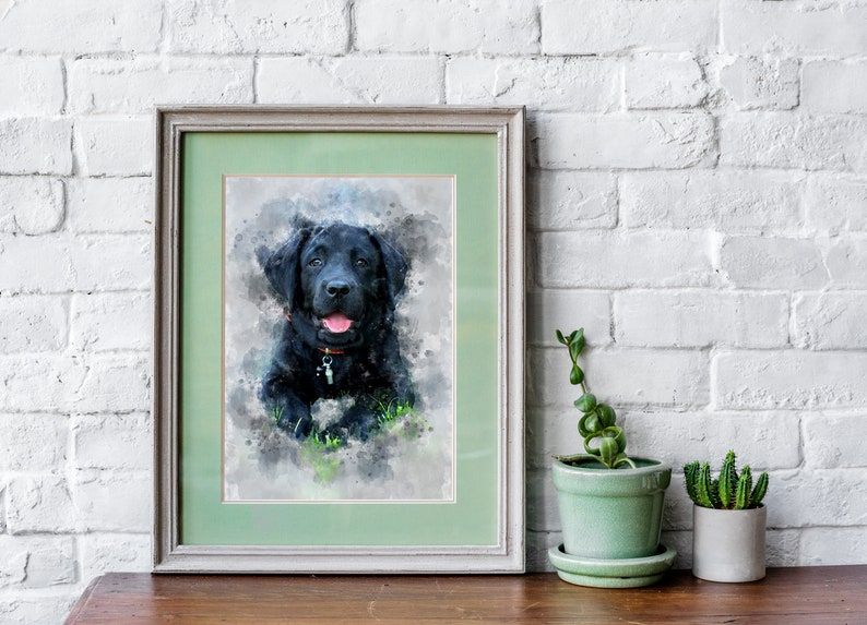 May include: A watercolor painting of a black Labrador Retriever puppy with a green background. The puppy is looking directly at the camera with its tongue sticking out.