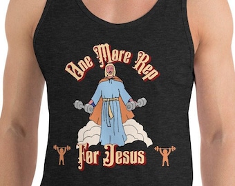 May include: Dark gray tank top with a graphic featuring a cartoon figure lifting weights, with the text "One More Rep For Jesus". The figure is dressed in a robe and holding dumbbells. The design is in shades of orange, blue, and white.