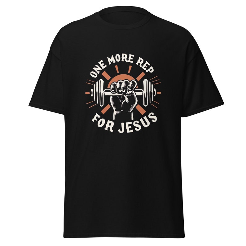 One More Rep For Jesus Unisex Gym T-Shirt for Gym depicting a logo of a hand lifting a dumbell in the style of vintage product illustration. Shirts for Christians who workout funny Gym shirt with Jesus weight lifting TShirt for gym