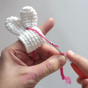 Crocheted Bunny ears yarn tension ring and tension guide pattern ( finger protector)