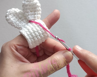 Crocheted Bunny ears yarn tension ring and tension guide pattern ( finger protector)