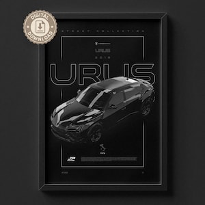 May include: Black framed print featuring a black Lamborghini Urus SUV. The print includes the text "URUS 2018" and "STREET COLLECTION". A digital download badge is in the upper left corner.