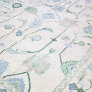 Hand Knotted Wool Oushak Rug: Modern Ivory, Blue & Green