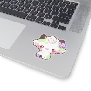 Puede incluir: Una ilustraci&oacute;n de dibujos animados de una vaca blanca con manchas verdes y una flor morada en la cabeza. La vaca tiene mejillas rosadas grandes y est&aacute; mirando hacia un lado.