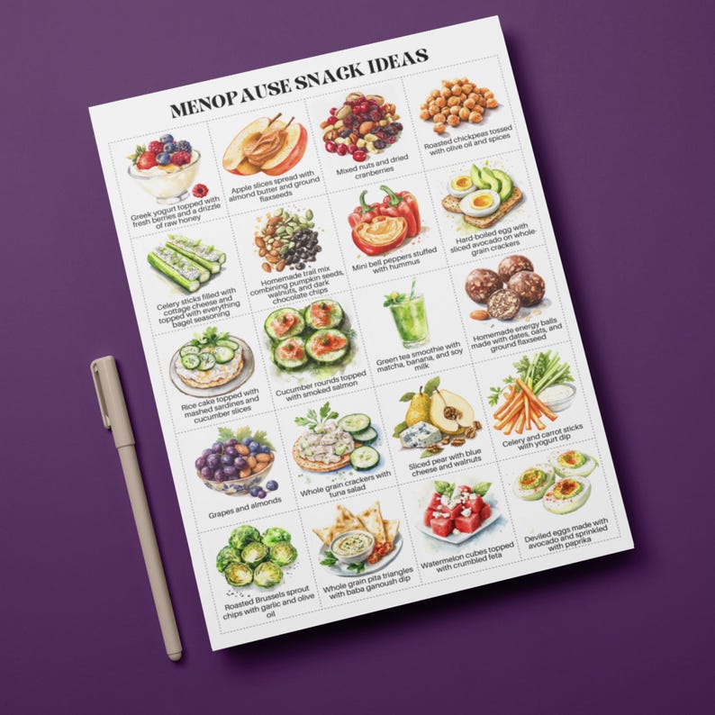 May include: A printed sheet titled "MENOPAUSE SNACK IDEAS" with illustrations of snacks like fruit, vegetables, and nuts. A pen lies on the purple surface beside the sheet.