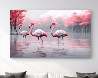 Op de afbeelding: Drie roze flamingo's staan in een stil water met een roze en grijs mistig bos op de achtergrond.