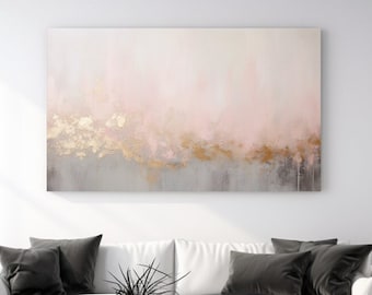 May include: A white sofa with two gray pillows sits in front of a large abstract painting with pink, gold, and gray tones. A small black side table is to the right of the sofa.