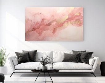 May include: Abstract painting with pink and gold hues. The painting features a flowing, abstract design with shades of pink and gold. The painting is displayed on a white wall above a white sofa with black throw pillows.