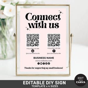 Może przedstawiać: Edytowalny szablon znaku DIY z różowym tłem i czarnym tekstem. Znak zawiera napis "Connect with us" i dwa kody QR z instrukcjami, jak śledzić firmę w mediach społecznościowych. Znak zawiera również miejsce na nazwę firmy, stronę internetową i wiadomość z podziękowaniami.