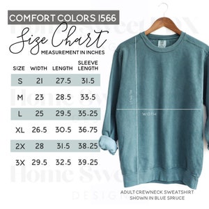 May include: Size chart for a crewneck sweatshirt in blue spruce. The chart shows measurements in inches for width, length, and sleeve length for sizes S, M, L, XL, 2X, and 3X.