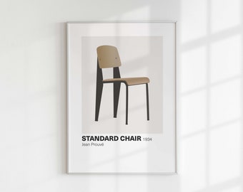 May include: A black and brown chair with a simple design. The chair is called "Standard Chair" and was designed by Jean Prouvé in 1934.