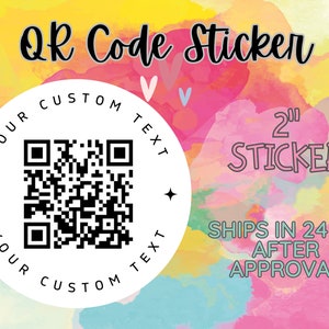 May include: A white circle with a black QR code in the center. The circle has the text "YOUR CUSTOM TEXT" around the outside. The background is a watercolor design with pink, yellow, blue, and green colors. The text "2" inch sticker" is in the upper right corner. The text "SHIPS IN 24Hrs AFTER APPROVAL" is in the lower right corner.