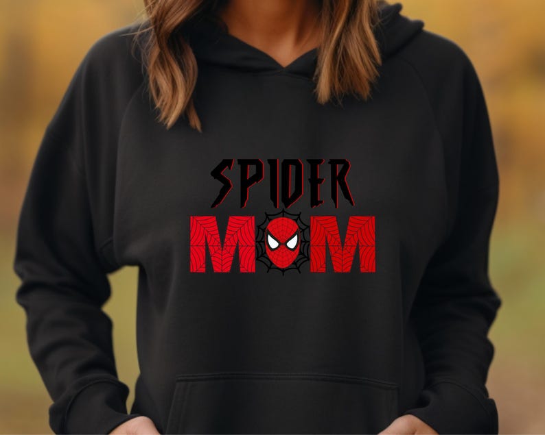 May include: Black hooded sweatshirt with the text "SPIDER MOM" in red and black with a red spider-man face in the middle of the word "MOM".