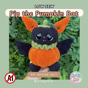 May include: A crochet plush toy shaped like a bat with a pumpkin body, featuring large black eyes, orange ears, and a green collar. The text reads LOW SEW, Pip the Pumpkin Bat, PDF PATTERN ONLY, and cro.by.chloe. The toy has a dark head and wings.