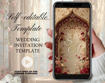 May include: A smartphone displays a wedding invitation template with floral and ornate design elements. The text on the screen includes initials "S A" and the date "12.09.2025". The phone is held in front of a floral background.