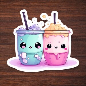 May include: Two cartoon bubble tea stickers. One is light blue with purple foam, the other is pink with peach foam. Both have black straws, smiling faces, and are on a pink oval.