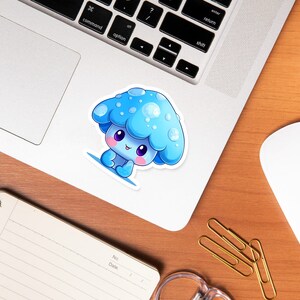 May include: A blue and white cartoon mushroom sticker with a cute face. The mushroom has a white stem and a blue cap with white spots.