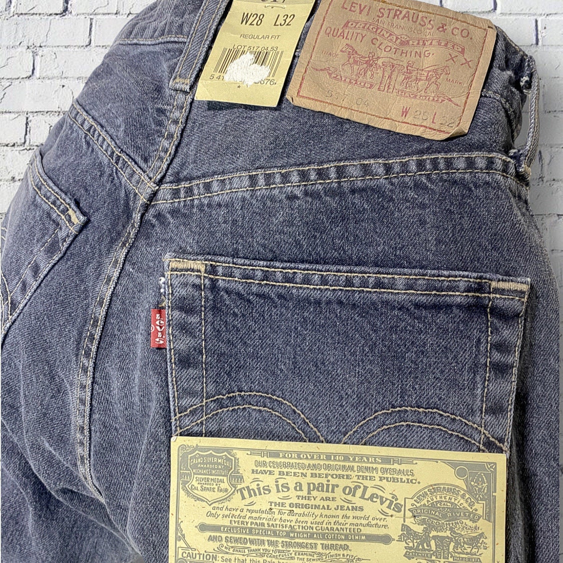 Vintage Levi's 517 Jeans: 90s High Waisted Bootcut Denim (W28 L32