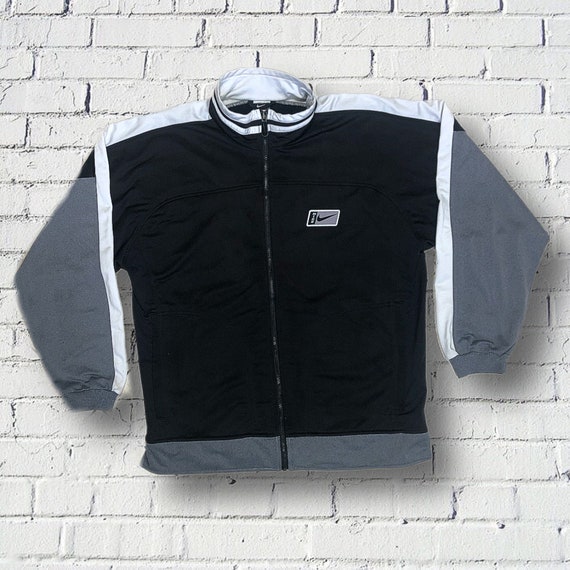 Nike black oversized track jacket deals