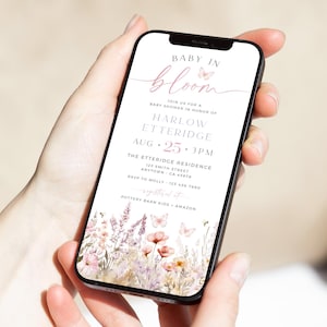 May include: A digital invitation for a baby shower with a floral design and the text "Baby in Bloom" in pink script. The invitation includes the name Harlow Etteridge, the date August 25th, the time 3 PM, and the location The Etteridge Residence. The invitation also includes RSVP information and a website for gifts.