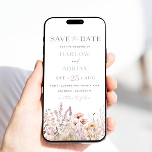 May include: A digital save the date announcement for a wedding. The announcement features a floral design with pink and white flowers and a white background. The text reads "Save the Date" for the wedding of Harlow and Adrian on Saturday, August 25th, two thousand and twenty, in Anytown, California. An invitation to follow is mentioned.