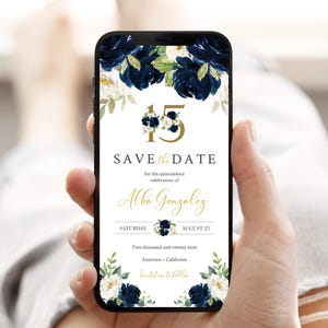 May include: A smartphone displays a quinceañera "Save the Date" invitation. The design features navy blue and white floral accents, gold text, and the name "Alba Gonzalez". The date is August 25.