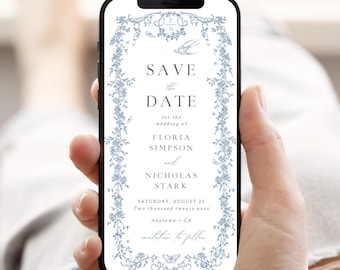 May include: A blue and white save the date card with a floral border and the text "Save the Date" for the wedding of Floria Simpson and Nicholas Stark on Saturday, August 25, Two thousand twenty xxxx, Anytown, CA.