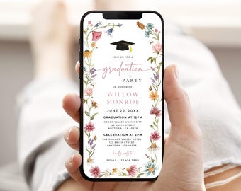May include: A floral graduation party invitation on a smartphone screen. The invitation features a wreath of flowers and a graduation cap. The text reads "Join us for a graduation party in honor of Willow Monroe, June 25, 20XX. Graduation at 12PM, Cedar Valley University, 123 Smith Street, Anytown, CA 45678. Celebration at 2PM, The Summer Valley Hotel, 123 Smith Street, Anytown, CA 45678. Kindly reply to Molly - 123 456 7890."