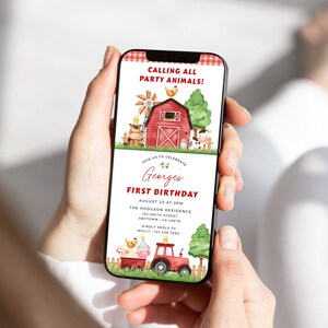 May include: A red and white gingham patterned phone screen displays a farm-themed first birthday invitation for a boy named George. The invitation features a red barn, farm animals, and a tractor. The text reads "Calling all party animals!" and "Join us to celebrate George's First Birthday." The invitation includes the date, time, location, and contact information.