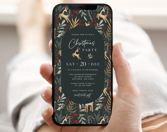 May include: A smartphone displays a Christmas party invitation. The invitation features a dark green background with gold deer and botanical illustrations. Text includes "Christmas Party," date, time, and RSVP information. The phone is held in a person's hand.