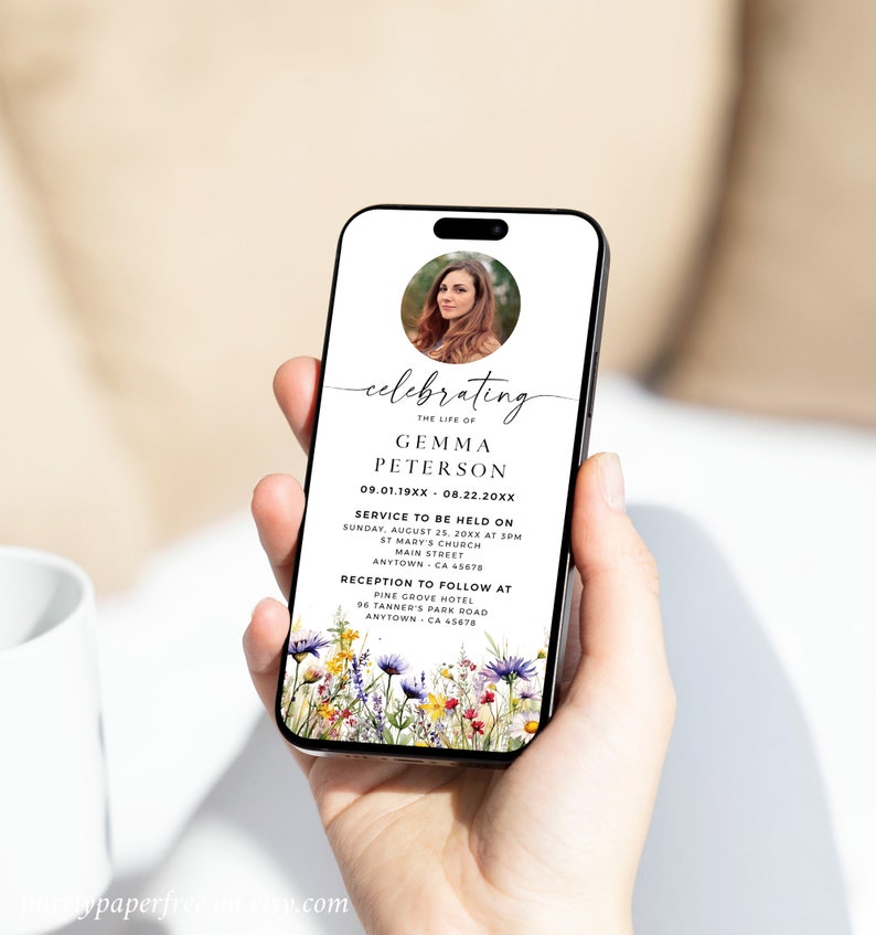 May include: A white smartphone screen displaying a memorial service announcement for Gemma Peterson. The announcement includes a photo of Gemma, the date and time of the service, and the location of the service and reception. The background of the announcement is a watercolor illustration of wildflowers.
