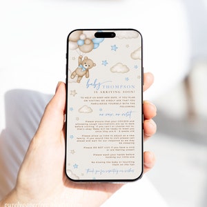 May include: A smartphone screen displaying a baby shower announcement with a cartoon teddy bear holding balloons. The announcement reads 'baby THOMPSON is arriving soon!' and includes a list of guidelines for visitors, including 'no vax, no visit' and 'Please ensure that your COVID19 and whooping cough vaccinations are up to date before visiting.' The announcement also includes a message thanking visitors for respecting their wishes.