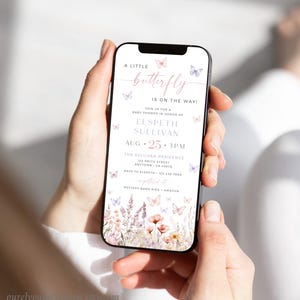 May include: A baby shower invitation with a watercolor butterfly design. The invitation is for a baby shower for Elspet Sullivan on August 25th at 3pm. The invitation includes the address and RSVP information. The invitation is on a white background with a floral border.