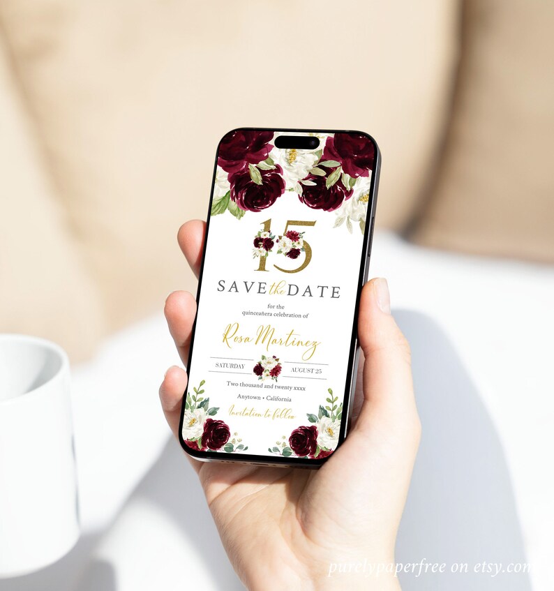 May include: A digital save the date card with a floral design featuring burgundy roses and white flowers. The text reads "15 SAVE the DATE for the quincea&ntilde;era celebration of Rosa Martinez SATURDAY AUGUST 25 Two thousand and twenty xxx Anytown, California Invitation to follow".
