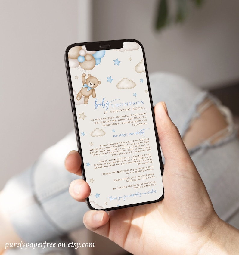 May include: A blue and white smartphone mockup with a baby shower invitation. The invitation features a cartoon teddy bear holding balloons, clouds, and stars. The text on the invitation reads: 'baby THOMPSON is arriving soon!' and 'no vax, no visit'. The invitation also includes a list of guidelines for visitors, such as ensuring they are up to date on their vaccinations and to not visit if they are sick.