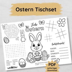 Può includere: Un set da tavola pasquale stampabile in bianco e nero con un coniglio, uova e un cruciverba. Il testo dice "Frohe Ostern", che significa "Buona Pasqua" in tedesco.