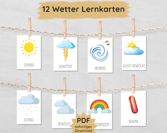Pode incluir: Doze flashcards ilustradas do tempo com palavras alemãs para cada condição meteorológica. Os cartões estão pendurados em um varal com prendedores de roupa. As condições meteorológicas incluem ensolarado, tempestuoso, ventoso, ligeiramente nublado, nevado, nublado, arco-íris e quente.
