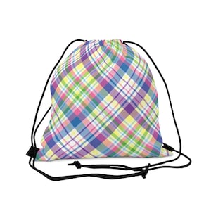 May include: A drawstring backpack with a colorful plaid pattern in shades of blue, purple, yellow, and green. The bag has black drawstrings and a black base. The bag is made of a soft, lightweight material.